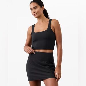 Athleta Salutation Stash 14.5” skort in black size small w/ pockets on shorts